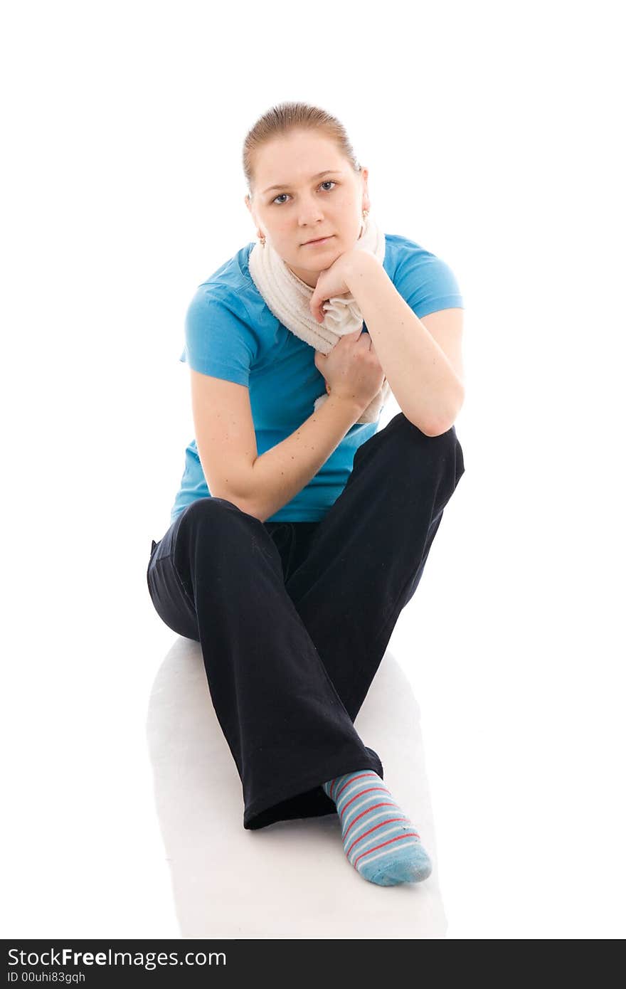 The young woman with the towel isolated on a white