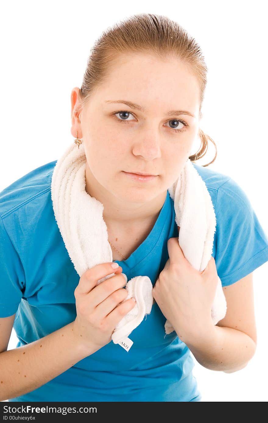 The young woman with the towel isolated on a white