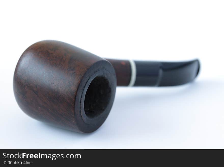 Old pipe on a white bacground