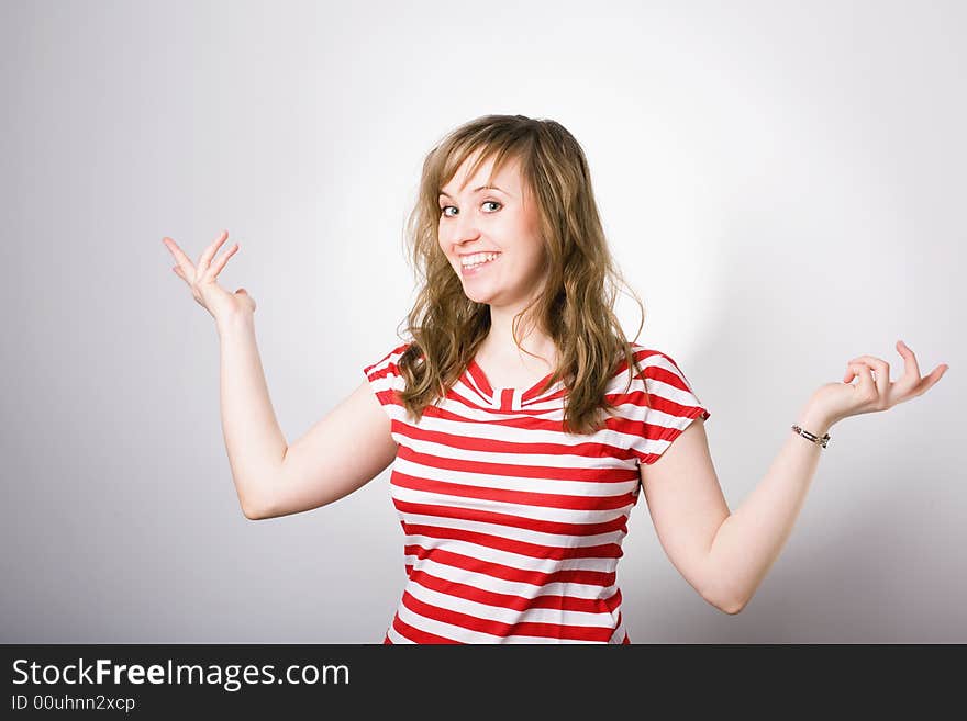 Smiling woman pointing something / copyspace /happy, beautiful, young girl