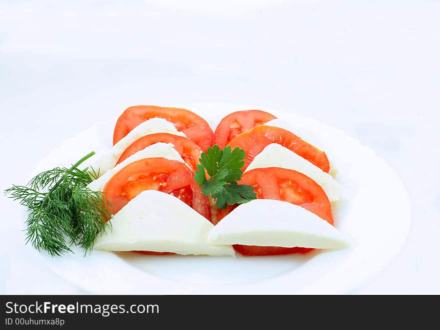 Red Tomatoes and slice on white background. Red Tomatoes and slice on white background