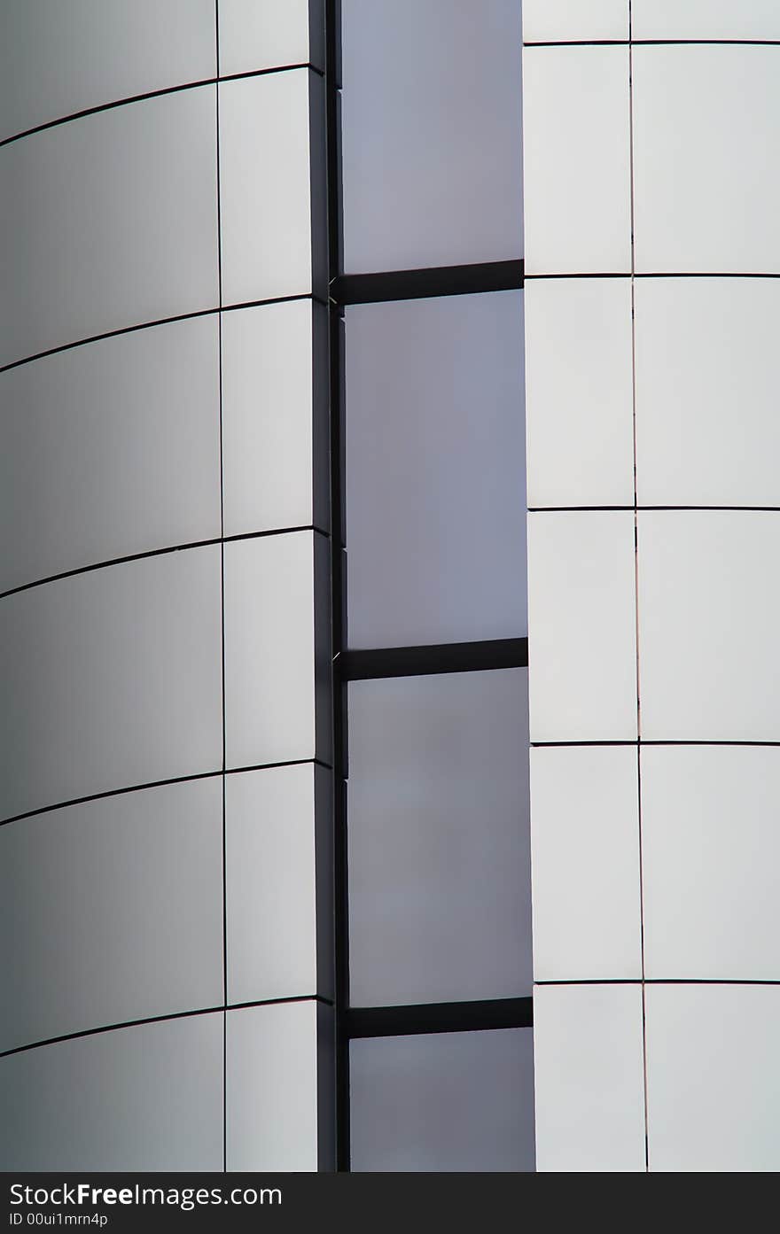 Silver building wall with windows. Silver building wall with windows