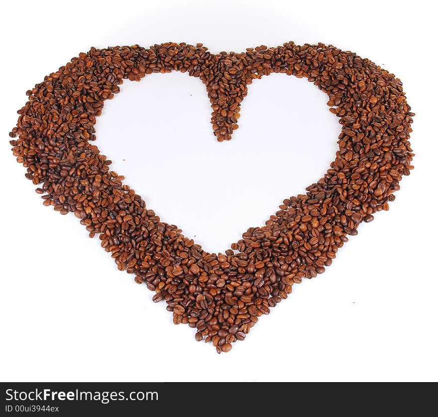 Coffee beans in a heart form isolated