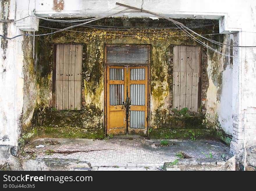 Dirty decayed house front in kuala lumpur