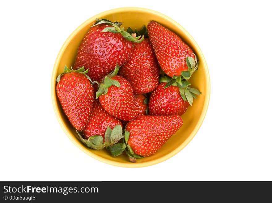 Strawberries on a yellow bowl. Strawberries on a yellow bowl