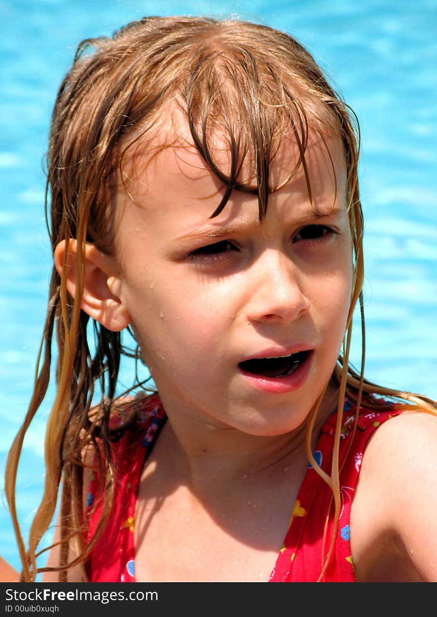 This is my daughter comng out of the pool all wet in florida wth a funny look on her face. This is my daughter comng out of the pool all wet in florida wth a funny look on her face