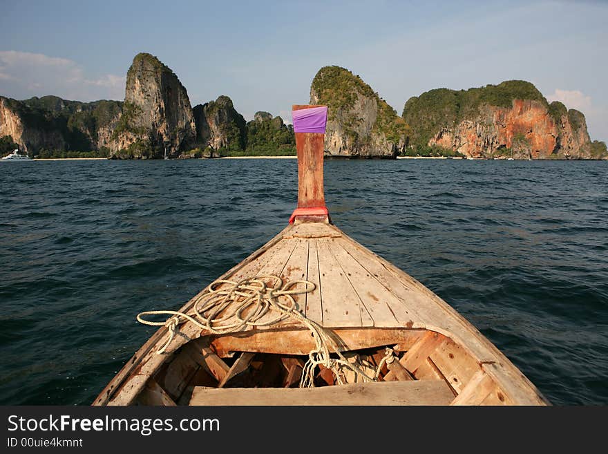 Beautiful longtail boat on the sand seashore. Beautiful longtail boat on the sand seashore