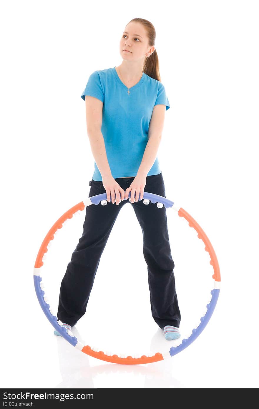 The young woman with the hoop isolated on a white background