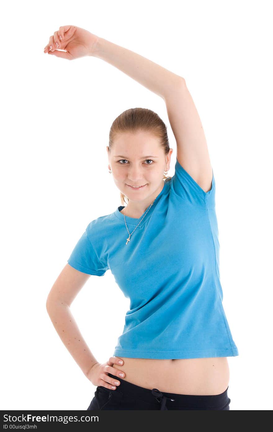 The Young Woman Doing Exercise Isolated On A White