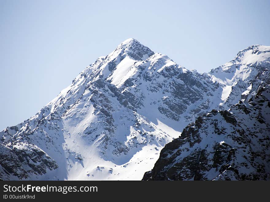 A close up of Pizzo Scalino mountain after a snowfall - Italy. A close up of Pizzo Scalino mountain after a snowfall - Italy