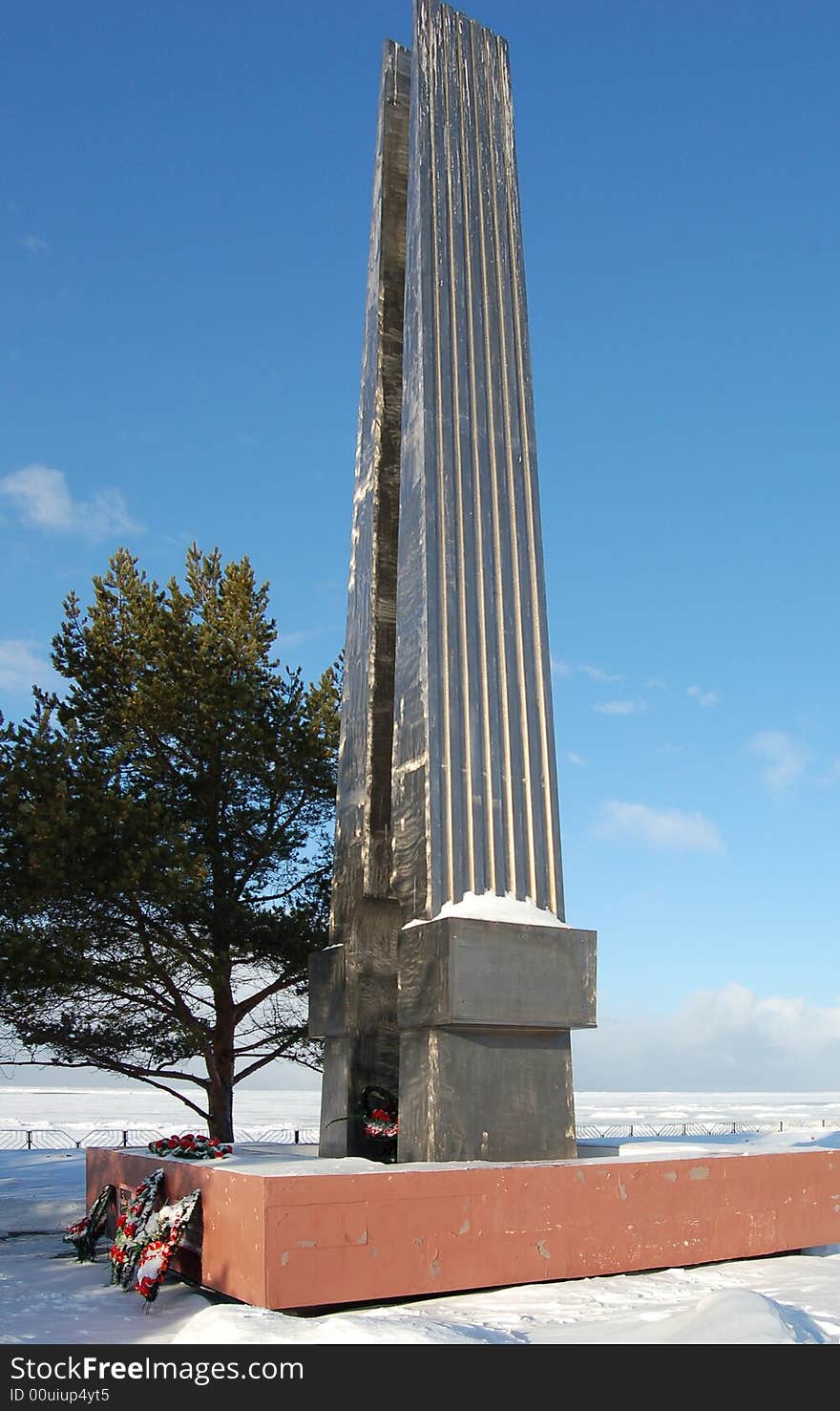 On quay of the White sea there is a monument, a number costs a tree, on the distant plan the frozen White sea. On quay of the White sea there is a monument, a number costs a tree, on the distant plan the frozen White sea.