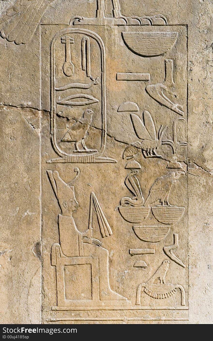 Egyptian symbols and texts carved in stone. Egyptian symbols and texts carved in stone