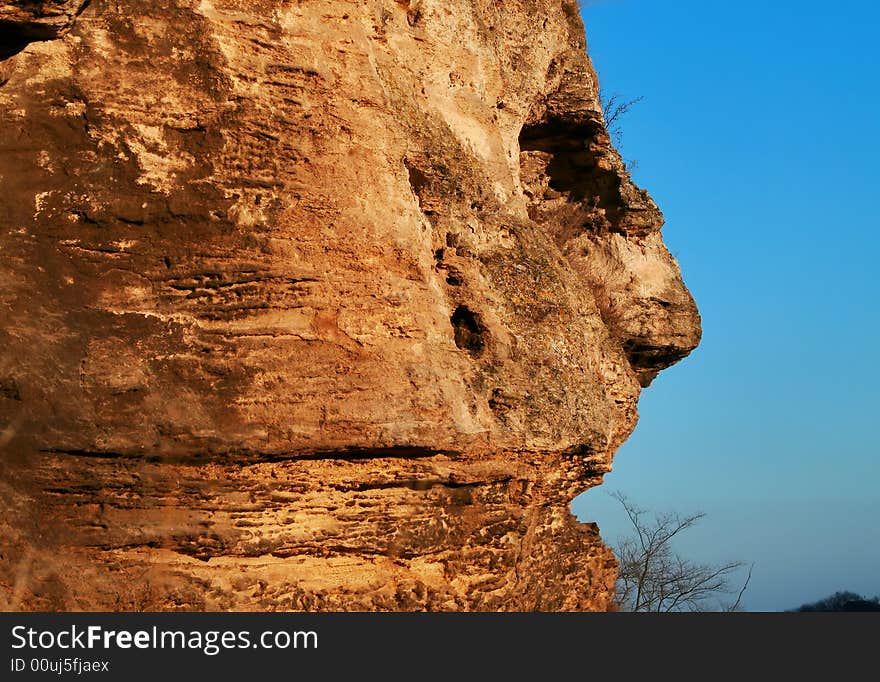 Person in a stone-natural a miracle on one of mountains in Crimea