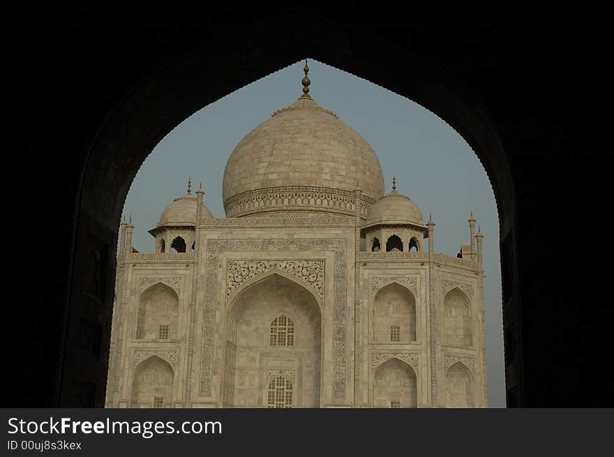 Taj Mahal viewed through arch at entrance