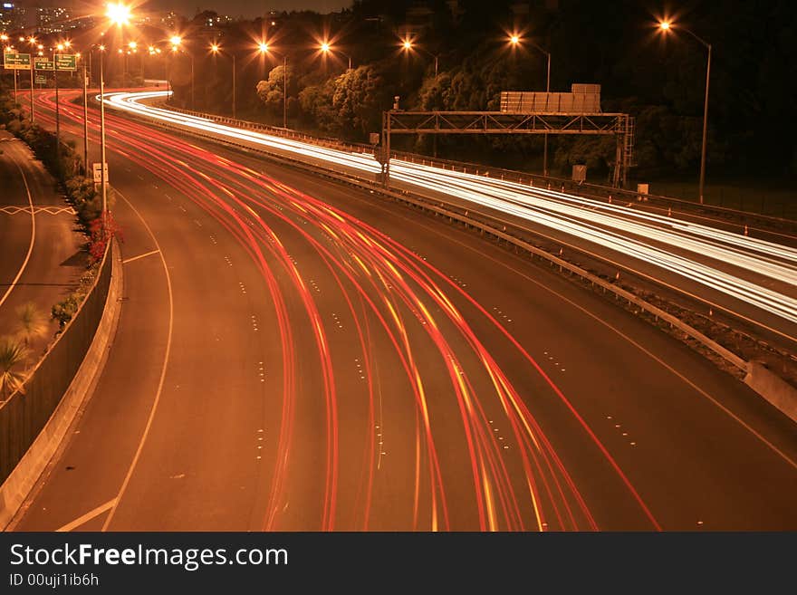 Motion Blur of car lights during evening traffic. Motion Blur of car lights during evening traffic