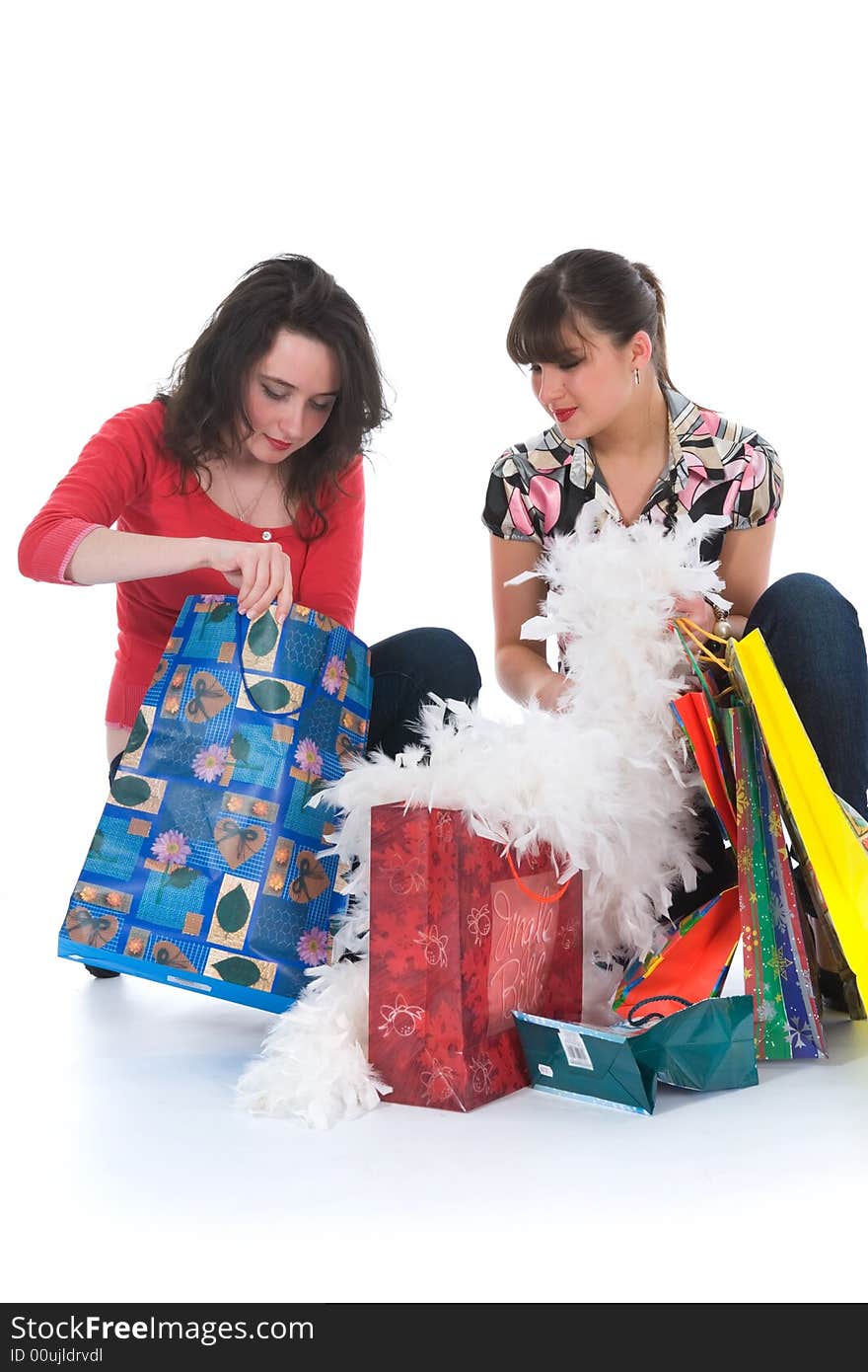 Expressive girls  on white background  shopping. Expressive girls  on white background  shopping