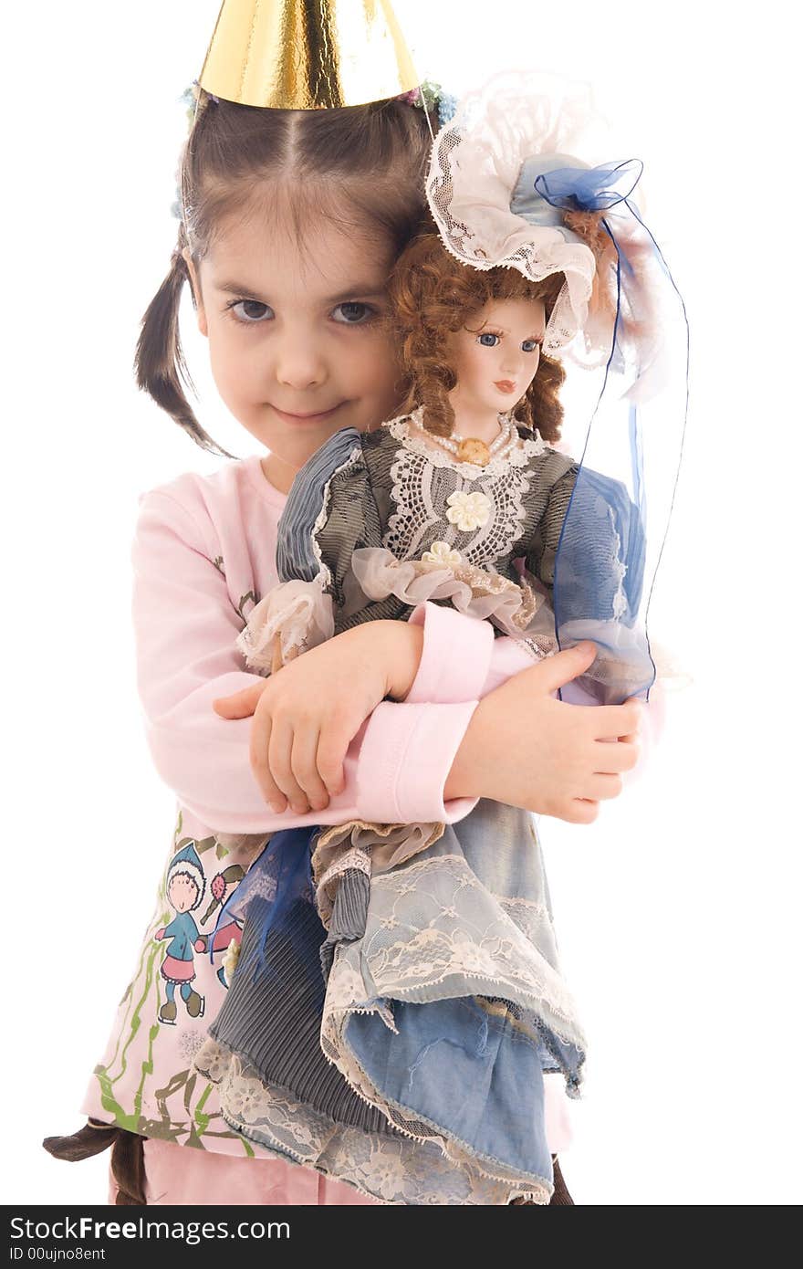 The little girl with a doll isolated on a white background