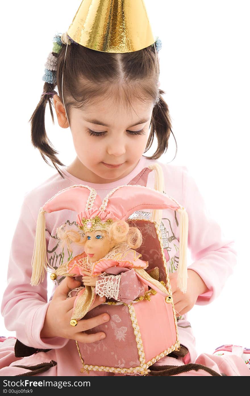 The little girl with a doll isolated on a white background