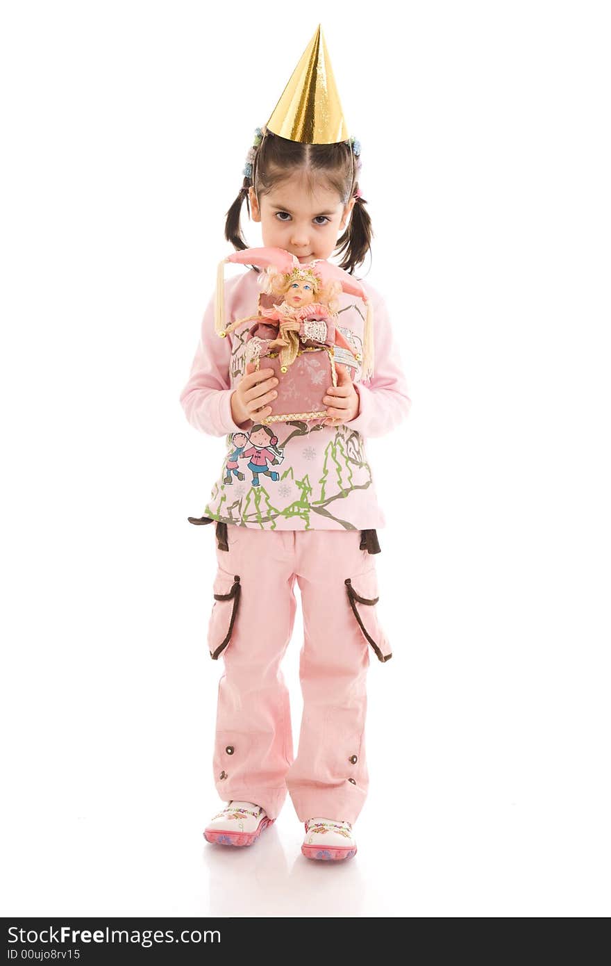 The little girl with a doll isolated on a white background