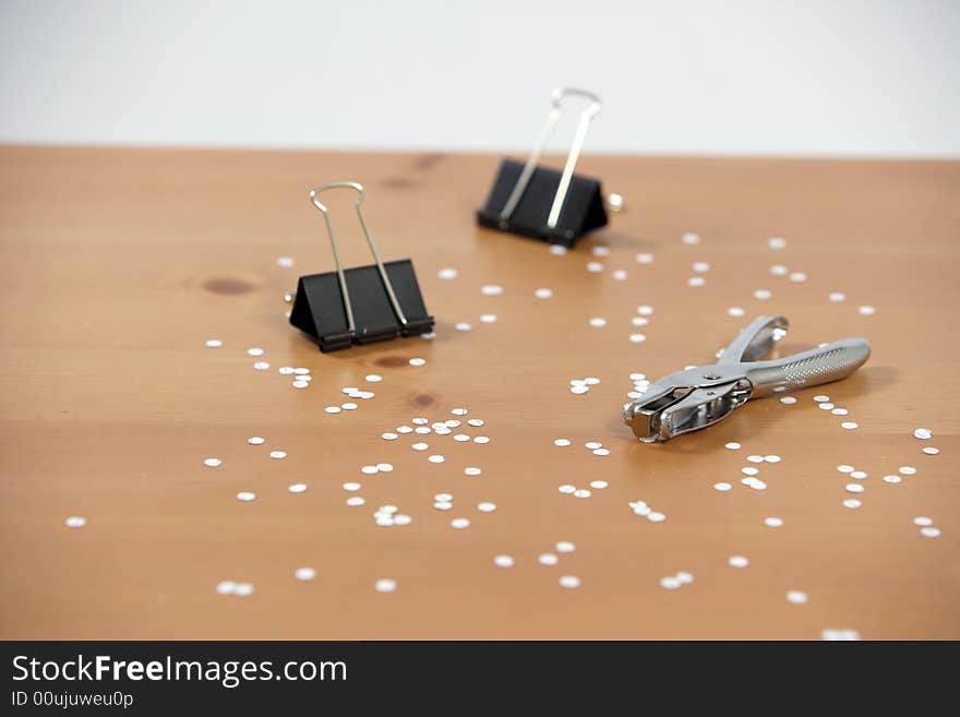 A hole punch on a desk in the office