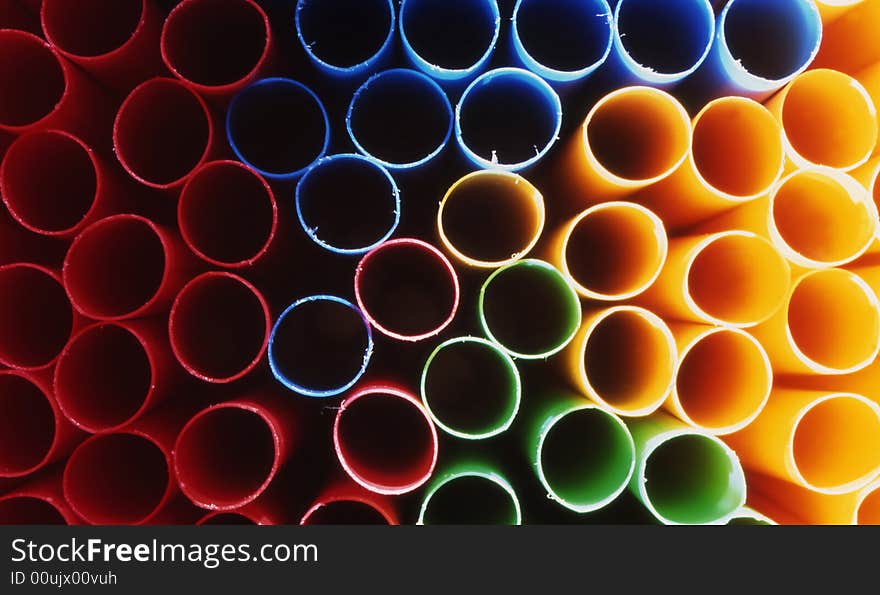 A close up with blue,yellow,green and red sticks