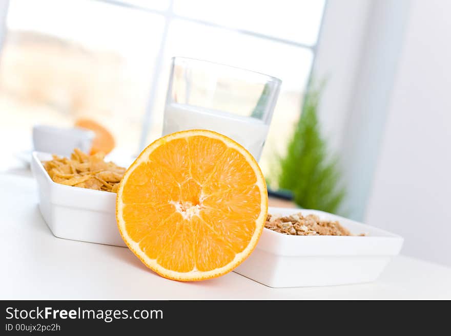 Orange, cornflakes and milk /Fast and delicious breakfast. Orange, cornflakes and milk /Fast and delicious breakfast