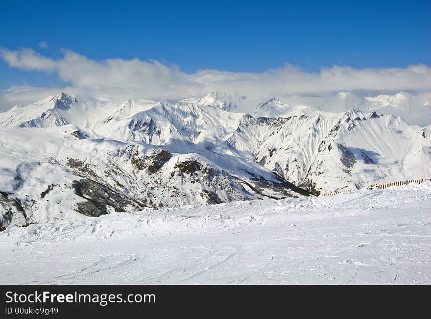 View over a snowy mountain valley. View over a snowy mountain valley