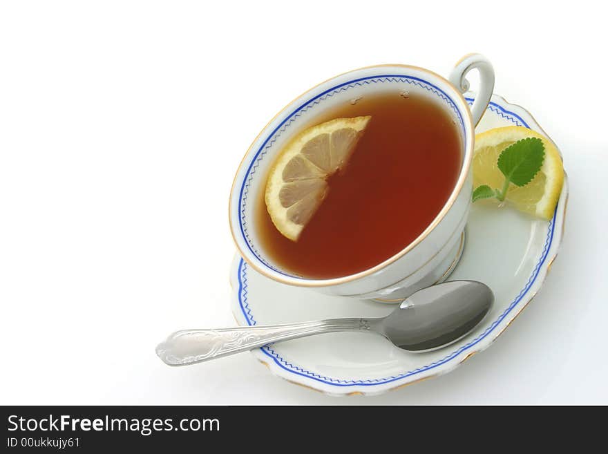 Cup of tea on white background