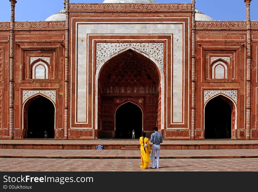 India, agra: taj mahal; the mosque of the  taj. a red stone monument with white domes