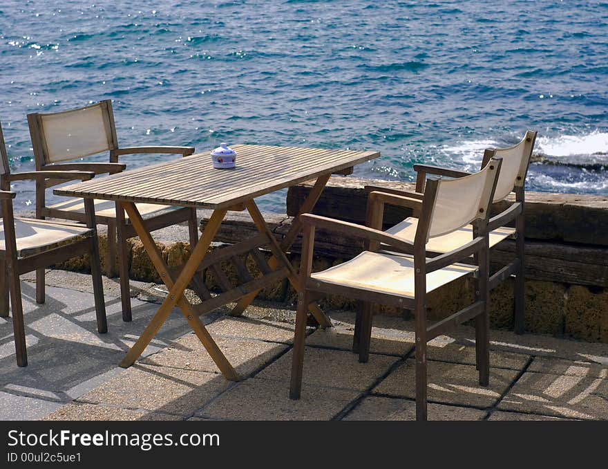 Table and chairs. Fish restaurant in Old Akko