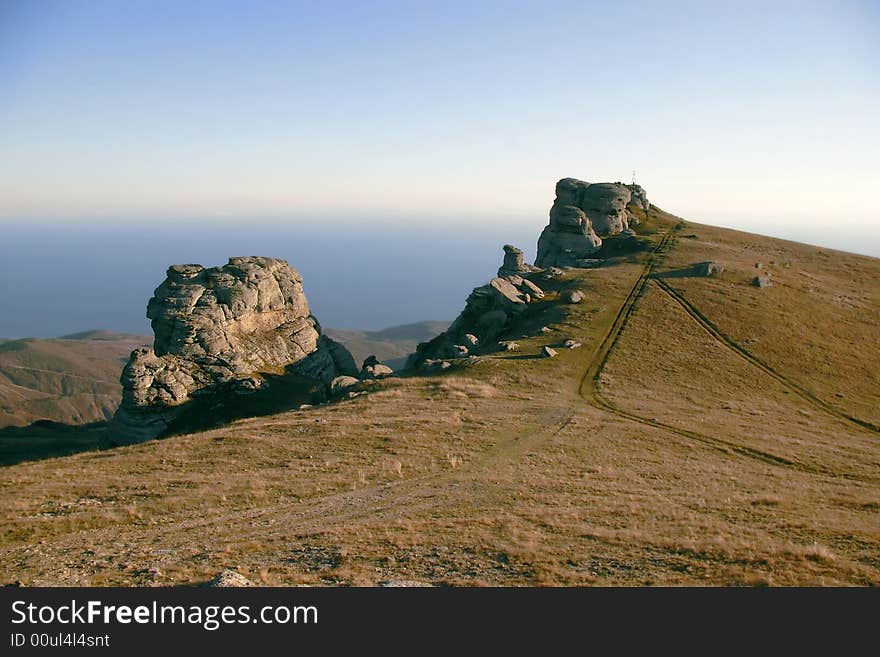 Stone formations, strange landscape on sky background