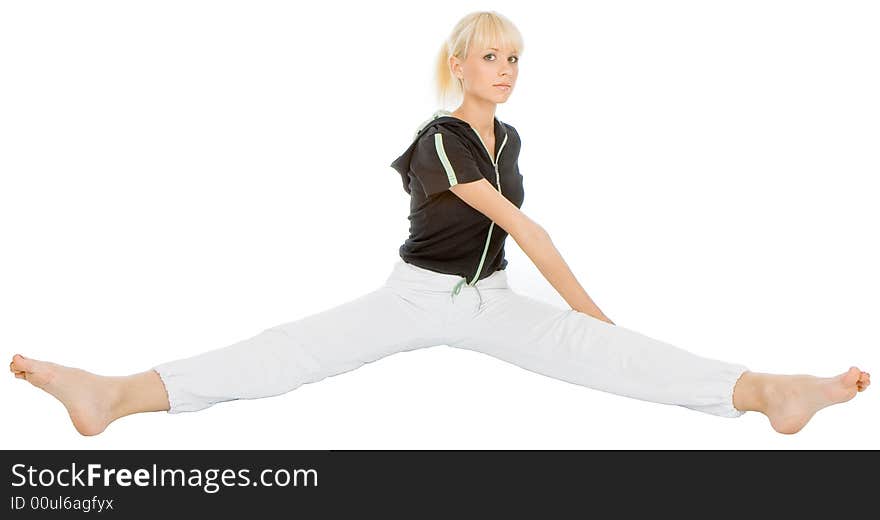 Beautiful young blondy doing yoga exercise