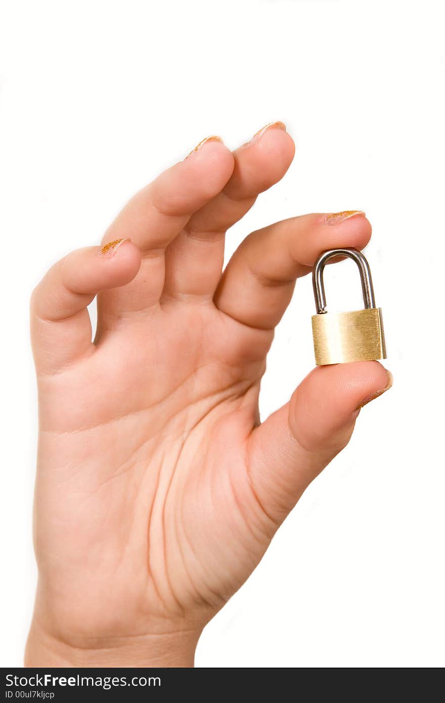 Small metal padlock in woman's fingers