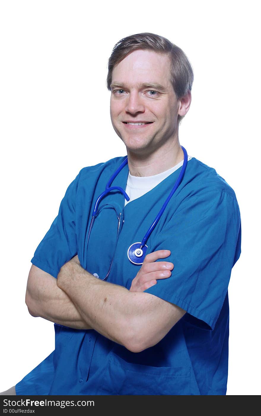 Handsome doctor smiling with his arms crossed