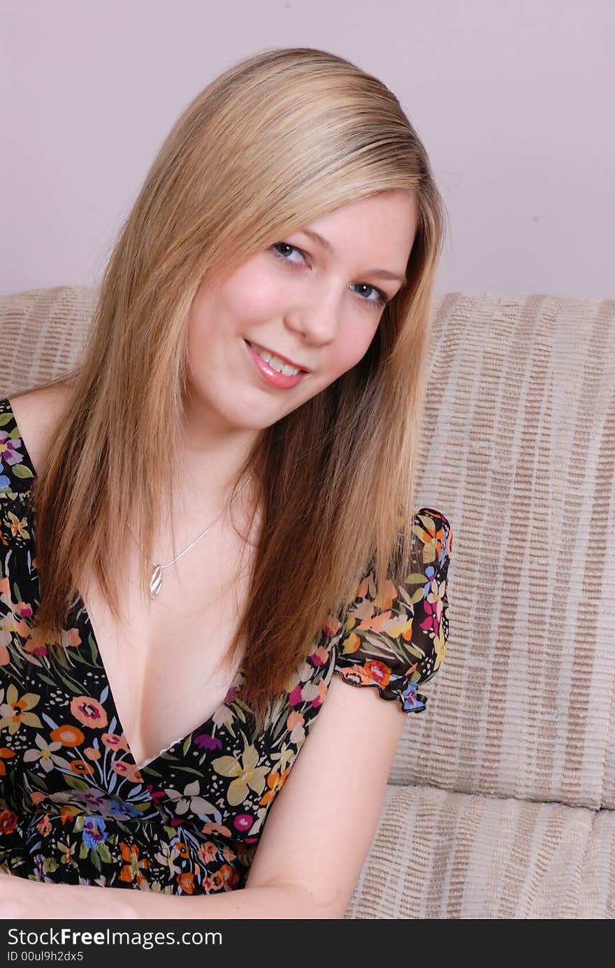 Portrait of attractive young girl smiling in contemporary home. Portrait of attractive young girl smiling in contemporary home