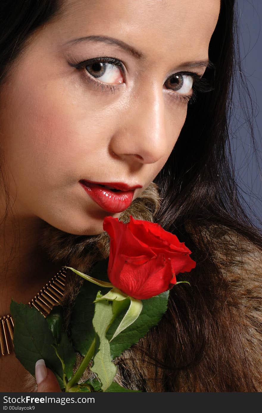 Beautiful woman with rose