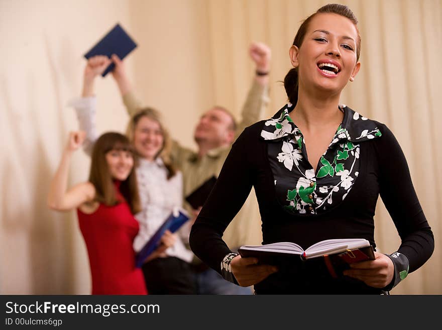 Businessmen and businesswomen at office and leader at front. Businessmen and businesswomen at office and leader at front