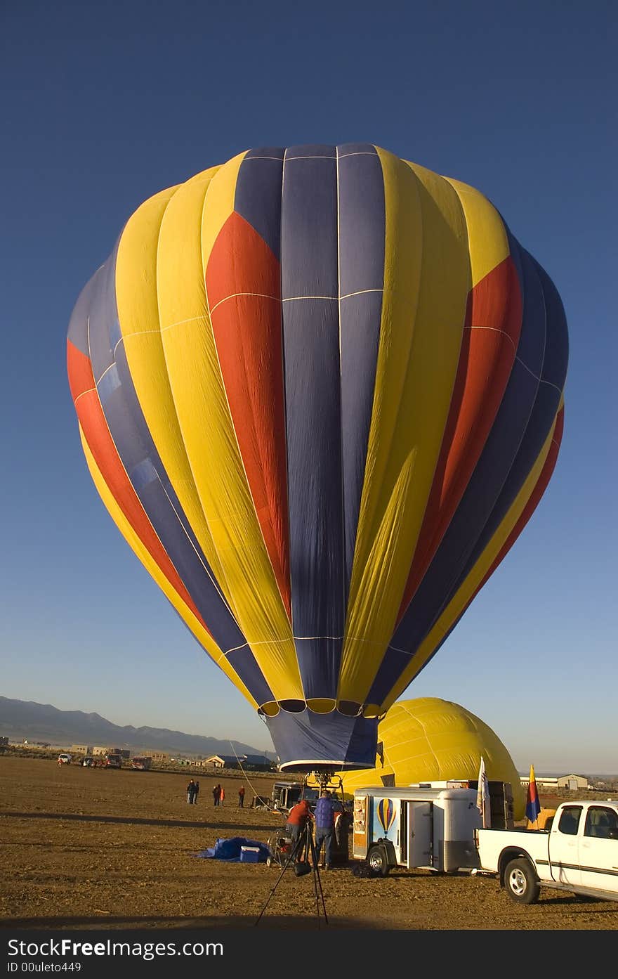 One of the many balloons at the Taos balloon festival being inflated at dawn