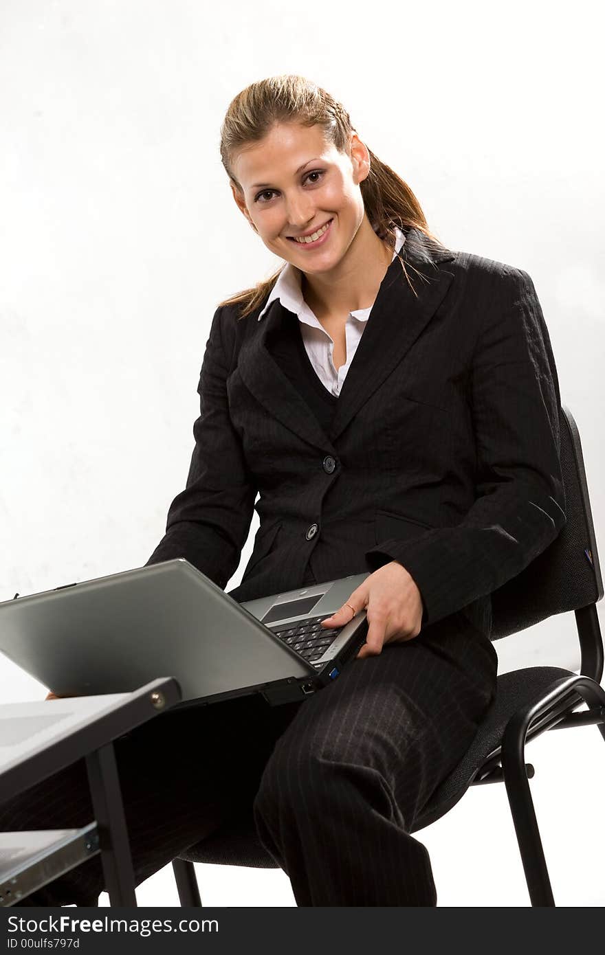 Nice caucasian girl with laptop isolated on white. Nice caucasian girl with laptop isolated on white