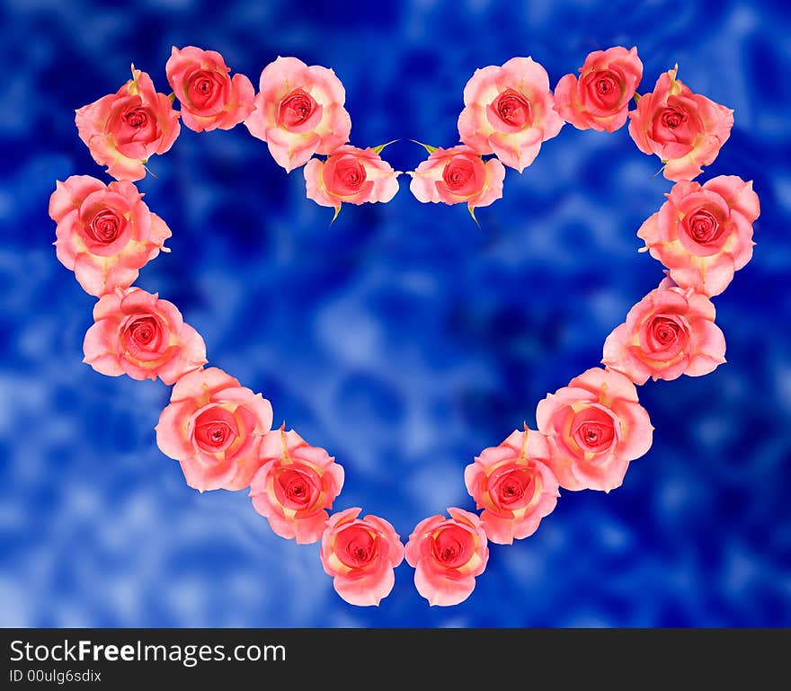 Heart shape from roses over blue mottled background. Heart shape from roses over blue mottled background