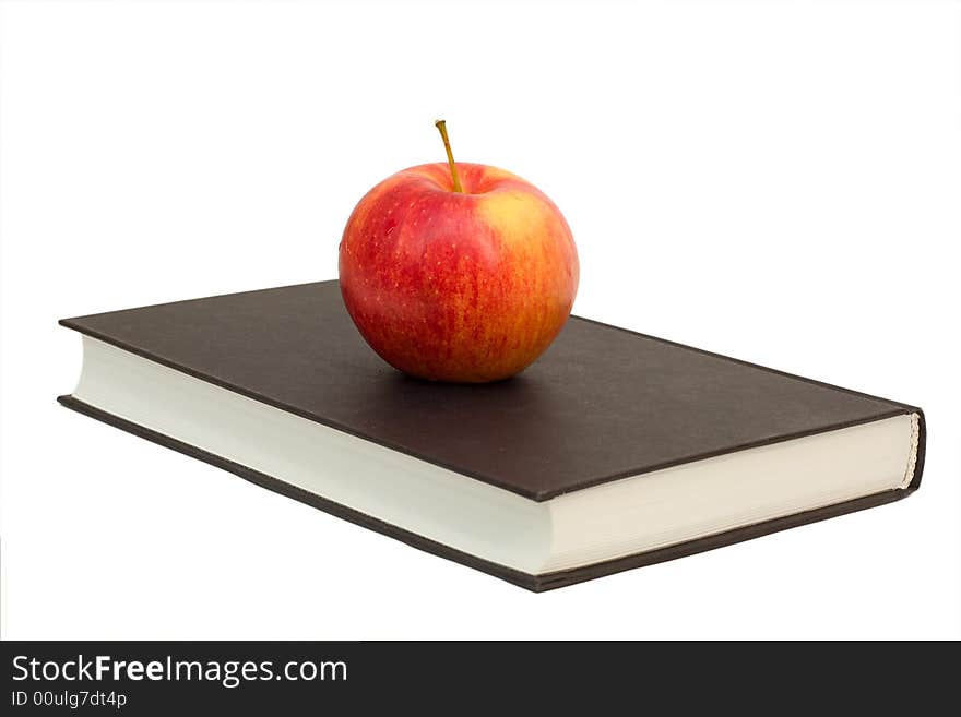 Red apple on book