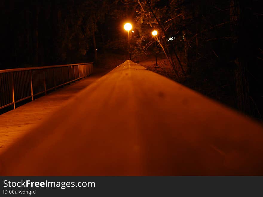 One of the bridge railings at night at UCSC