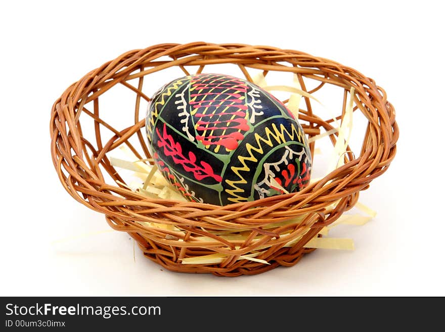 Easter Eggs in a basket with white background