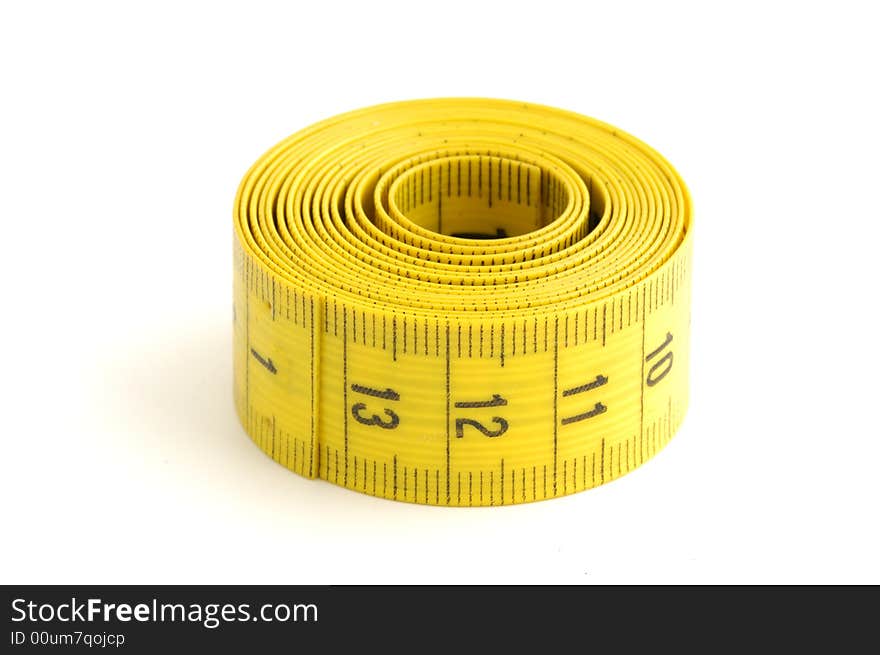 Measuring tape of the tailor in background white