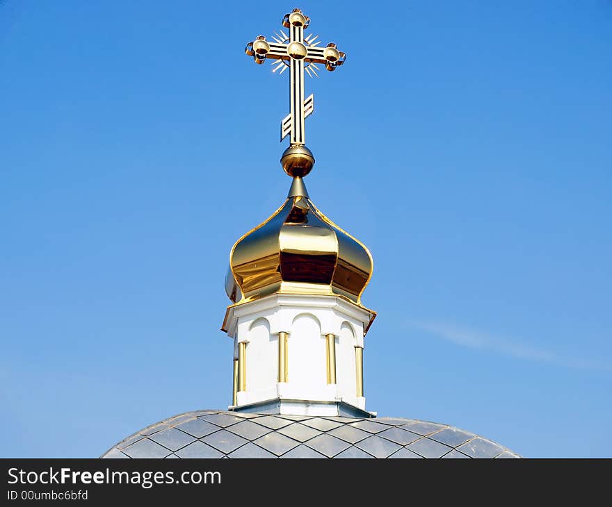 Gilded Cross on the Top of the Chapel Dome