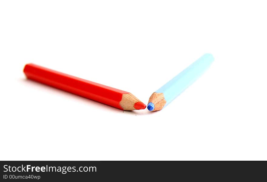 Two pencil, blue and red, over white. Two pencil, blue and red, over white