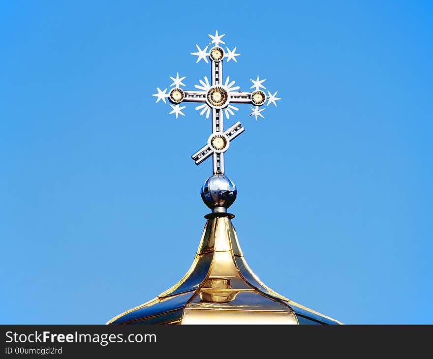 Gilded Cross on the Top of the Chapel Dome