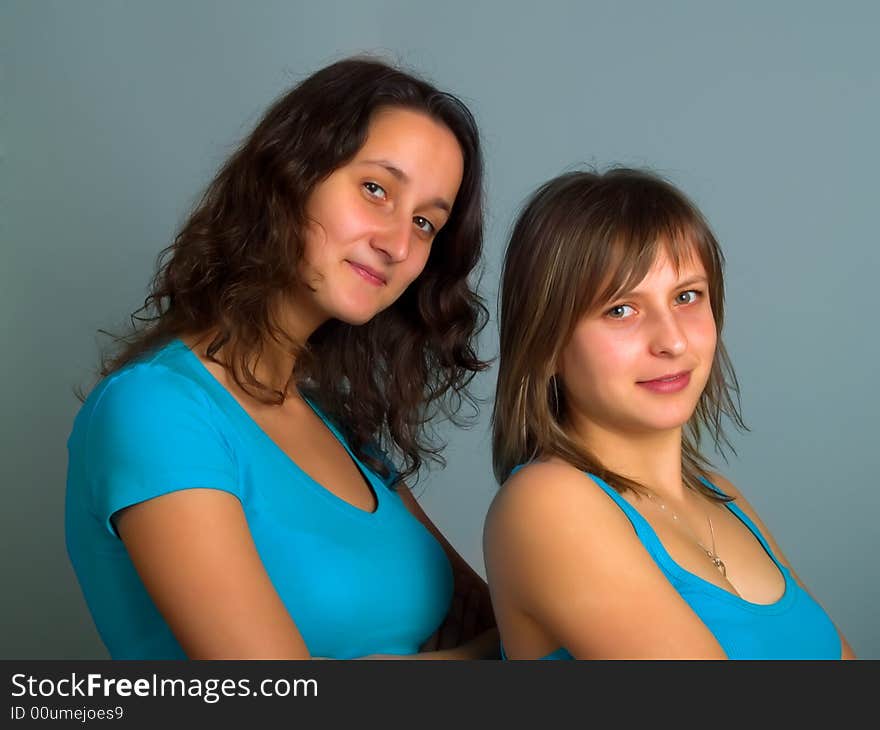 Two pretty ladies with brown and blond hair. Two pretty ladies with brown and blond hair