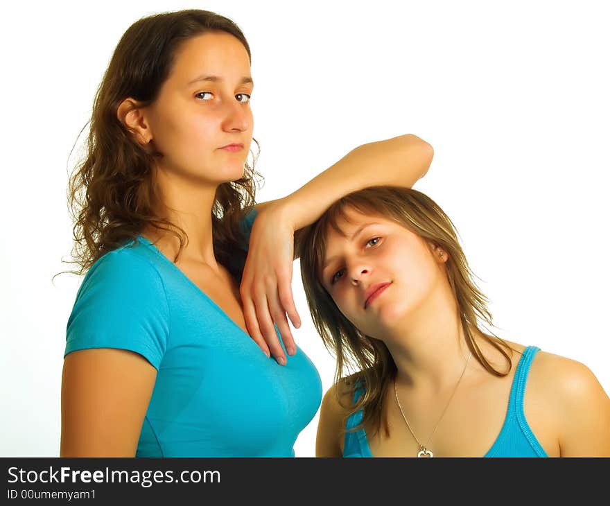 Two pretty ladies with brown and blond hair. Two pretty ladies with brown and blond hair