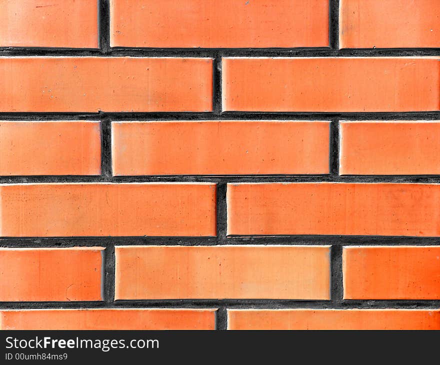 Wall made of red and yellow bricks. Wall made of red and yellow bricks